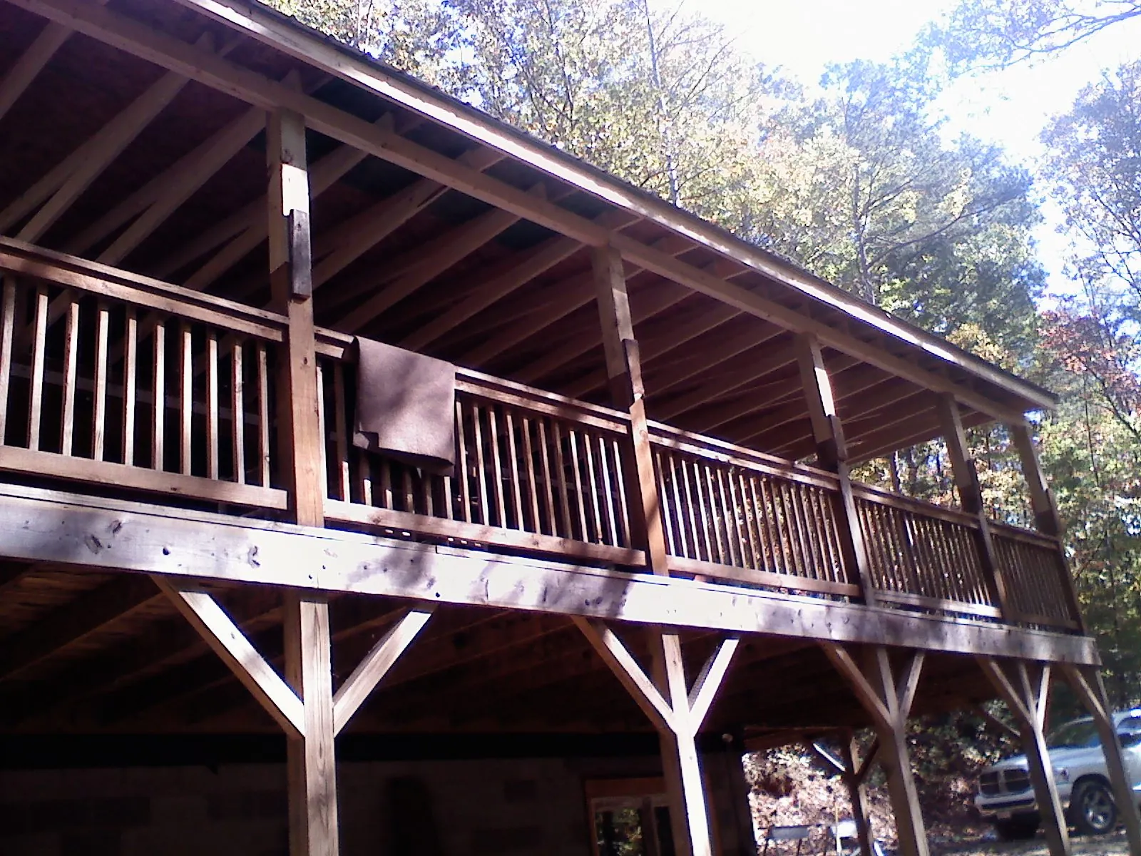 Timber framing under a new elevated porch and deck — Roof Leak Repair in Monterey by Roofing Brothers